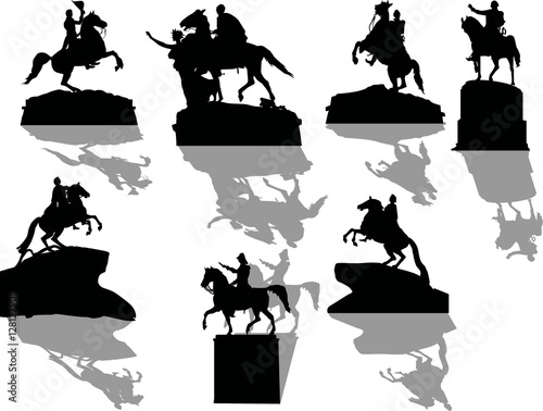 set of seven horseman statues with shadows