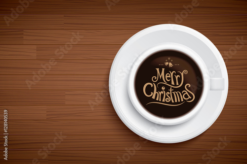 coffee mug with words merry Christmas on brown wood table
