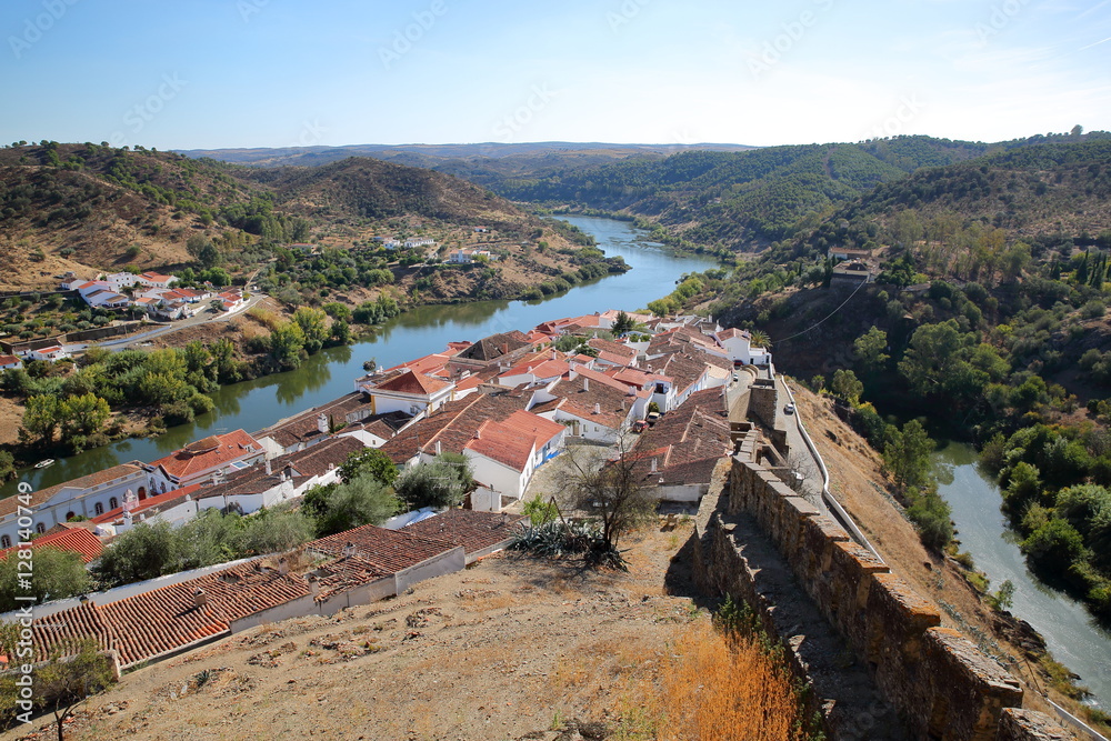 MERTOLA, PORTUGAL: General view of the fortified village and the surrounding hills from the castle