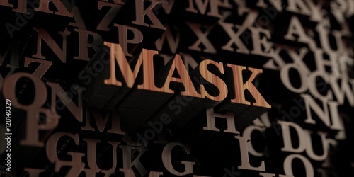 Mask - Wooden 3D rendered letters/message. Can be used for an online banner ad or a print postcard.