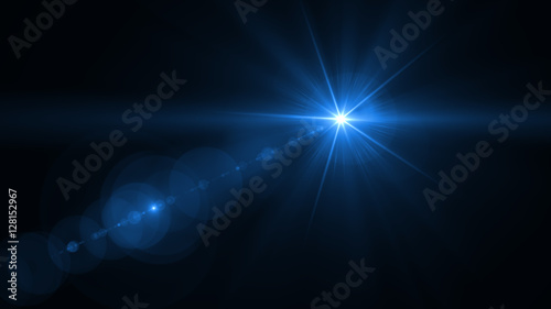 abstract lens flare yellow light over black background photo