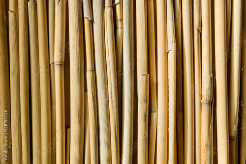 Stems straw closeup stacked in row.