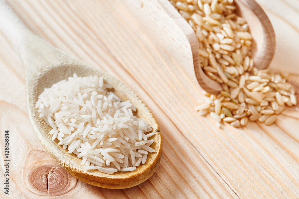 Basmati rice and brown rice on spoon Basmati rice and brown rice on spoon