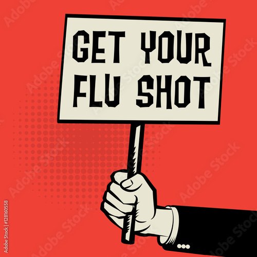 Poster in hand, business concept with text Get Your Flu Shot