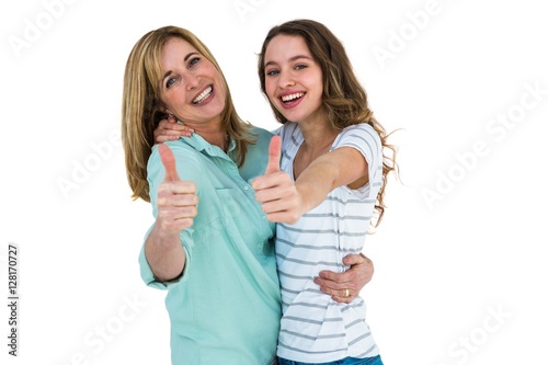 Happy mother and daughter smiling