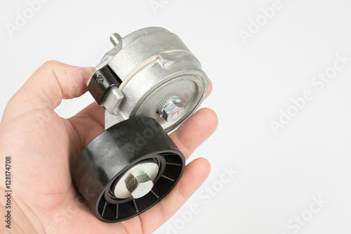 Car belt tensioner roller isolated over white