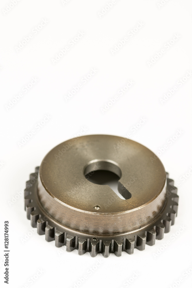 Metal gear wheel isolated over white background with copy space Metal gear wheel isolated over white background with copy space