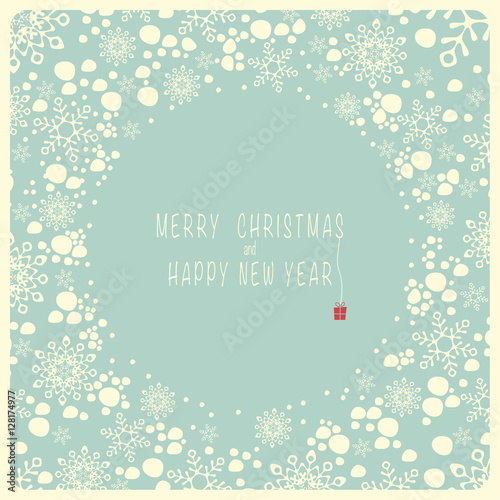 The cover design. Depicts snowflakes and the snow on the blue background. In the center of the blue circle with the words merry Christmas and a happy New year.