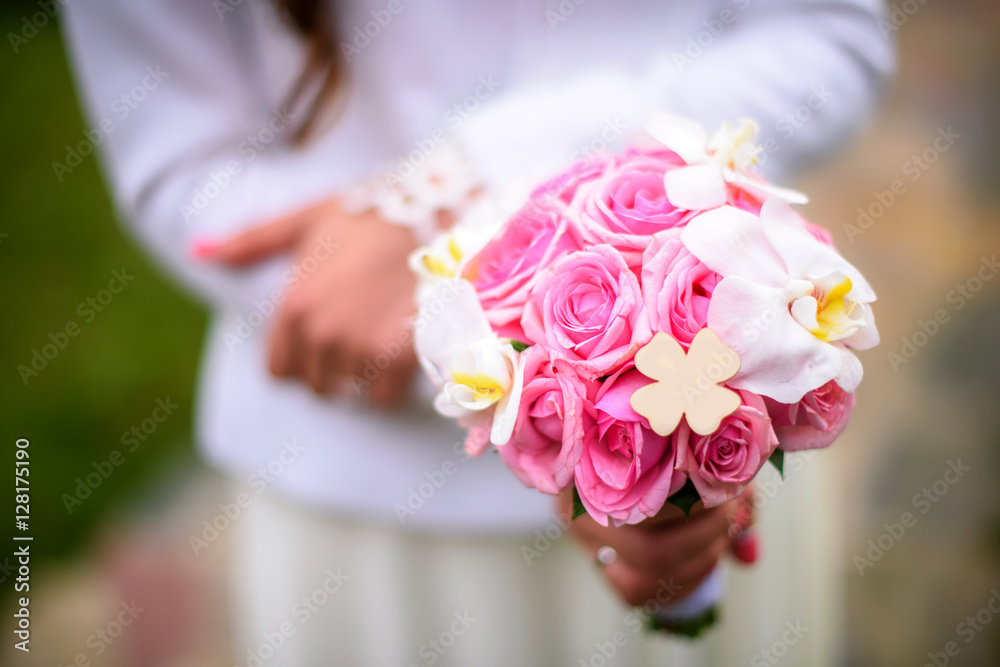 bouquet of flowers in hands bride