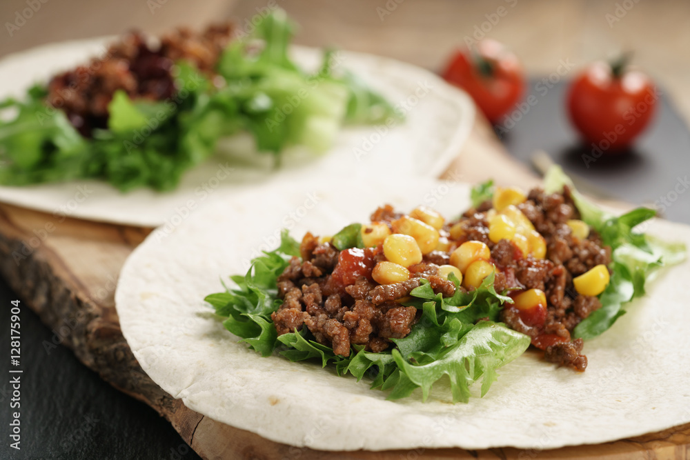 open tortilla with beef, frillice and corn, organic fastfood open tortilla with beef, frillice and corn, organic fastfood