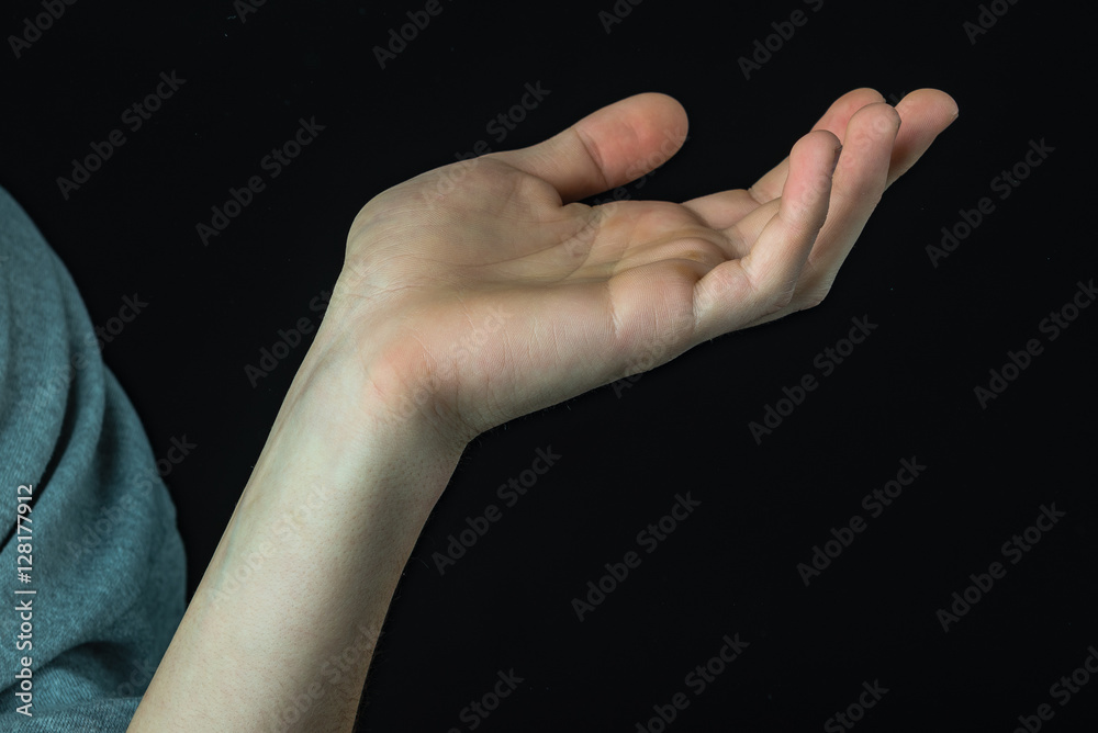 human hand showing signs. isolated on black human hand showing signs. isolated on black