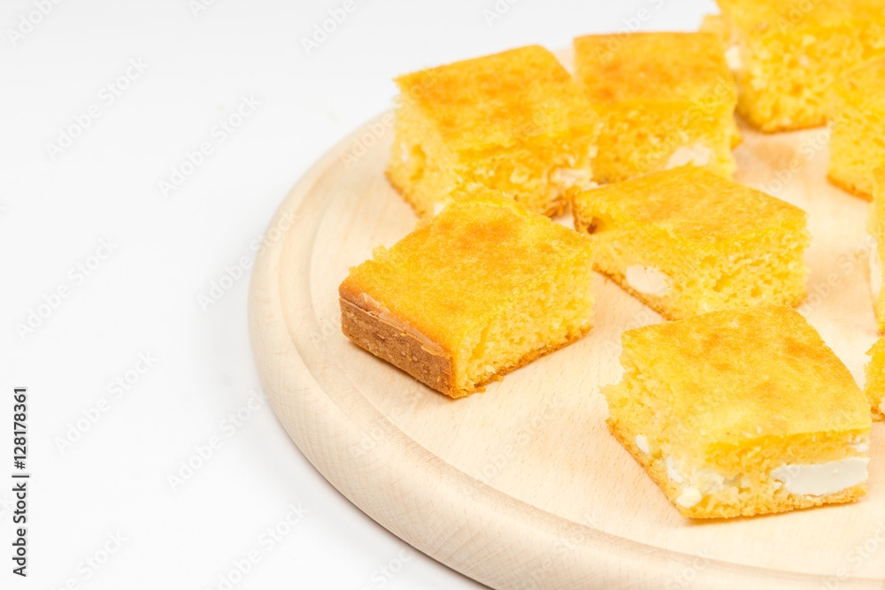 Cornbread slices on the wooden board Cornbread slices on the wooden board