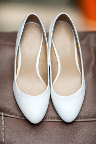 White simple leather wedding shoes, view from above