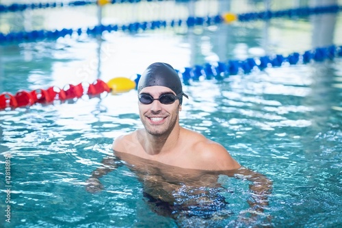 Handsome man swimming