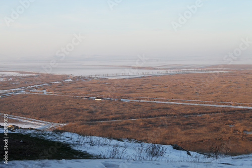 Winter landscape misty plain