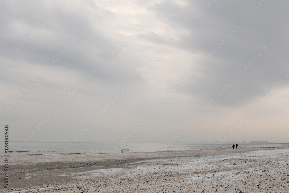 Winter black sea beach in winter sky landscape Winter black sea beach in winter sky landscape