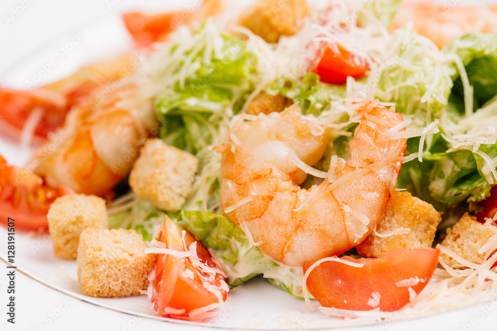 seafood caesar salad with shrimps, salad leaf, parmesan cheese seafood caesar salad with shrimps, salad leaf, parmesan cheese
