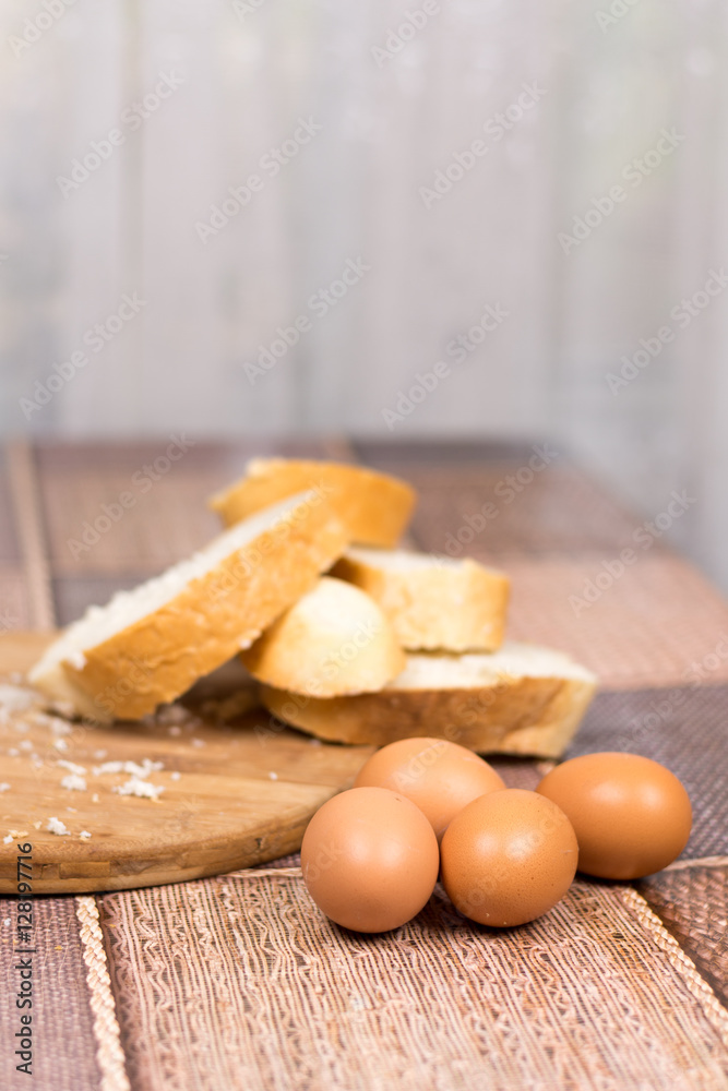 Preparing french toast with eggs for breakfast Preparing french toast with eggs for breakfast