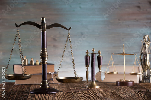 Mallet, legal code and statue of justice. Law concept, studio shots photo