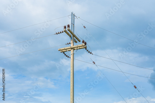 Electricity, High Voltage Cable and Pole with Blue Sky