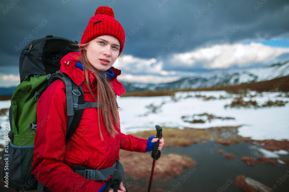 Shot of a young woman looking at the landscape while hiking in the mountains Lifestyle hiking concept