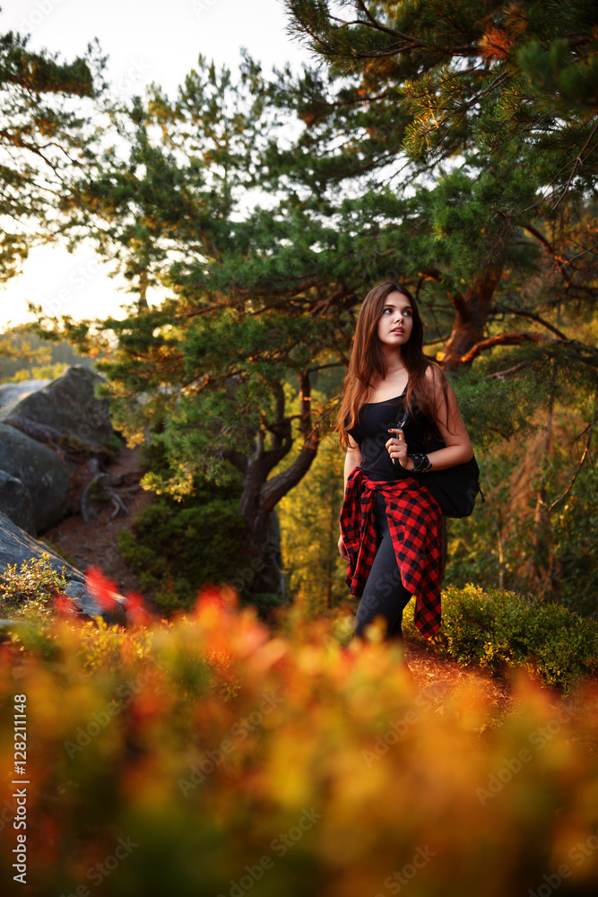 Woman hiking. Hike in the mountains. Woman traveler with backpack on beautiful landscape. Woman hiking. Hike in the mountains. Woman traveler with backpack on beautiful landscape.