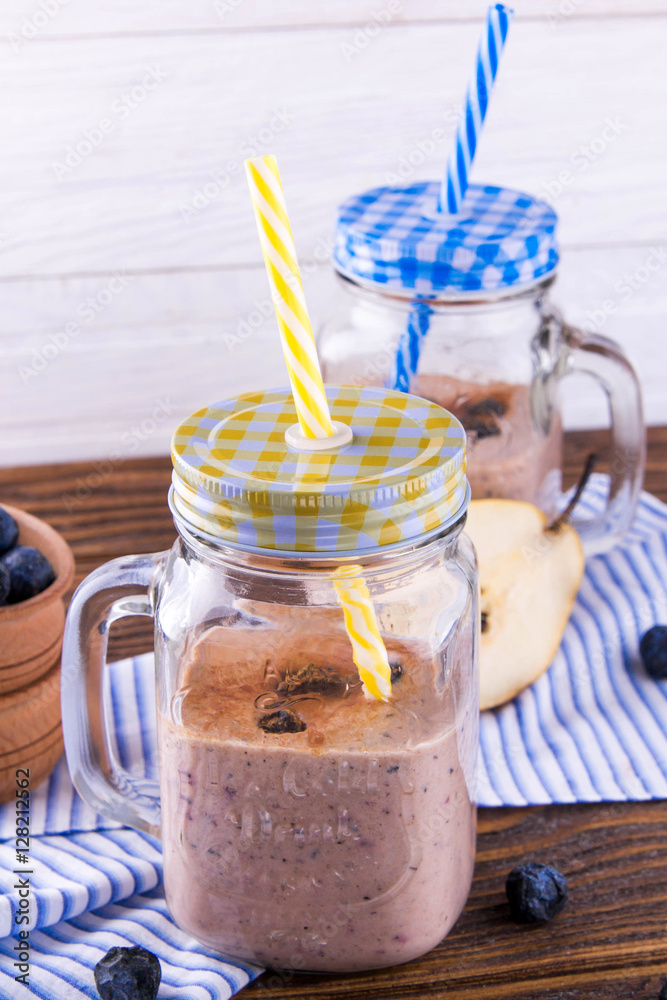 Fototapeta premium Blackberry smoothie in the glass jars