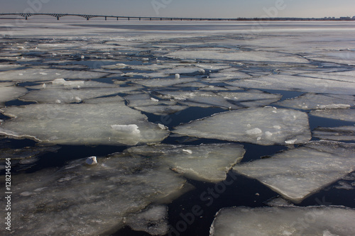Ice floes on the river. Great Volga River.