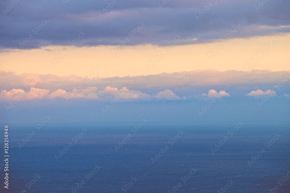 Marine horizontal landscape at sunset, pink clouds