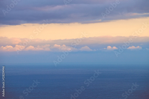 Marine horizontal landscape at sunset, pink clouds