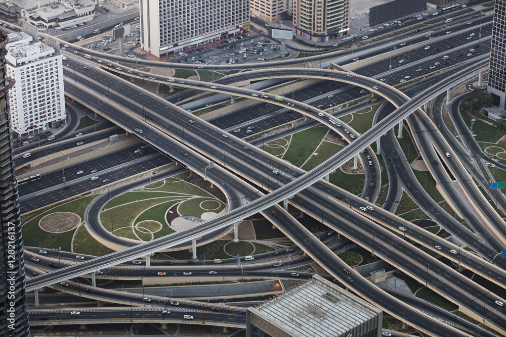Fototapeta premium Architecture theme and concept. Dubai main intersection. Aerial view. Futuristic city.