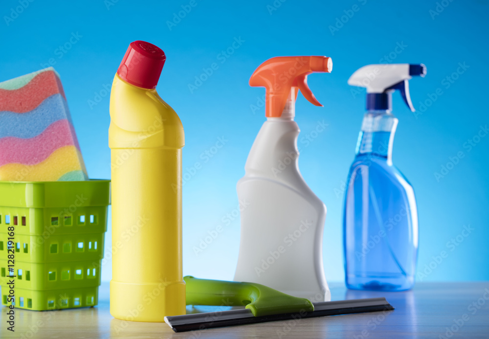 Variety of cleaning products,home work, on blue background Variety of cleaning products,home work, on blue background