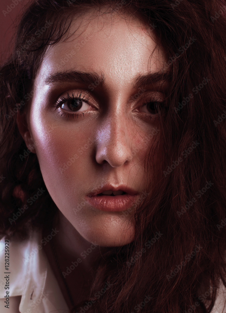 Portrait of a beautiful girl with freckles and light wear make up Portrait of a beautiful girl with freckles and light wear make up