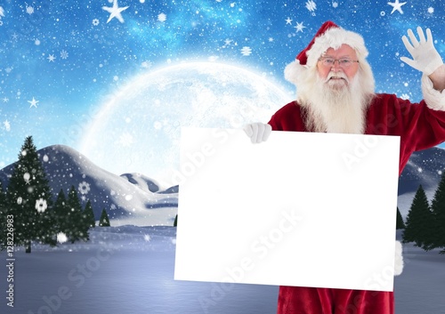 Santa claus waving while holding blank placard © vectorfusionart