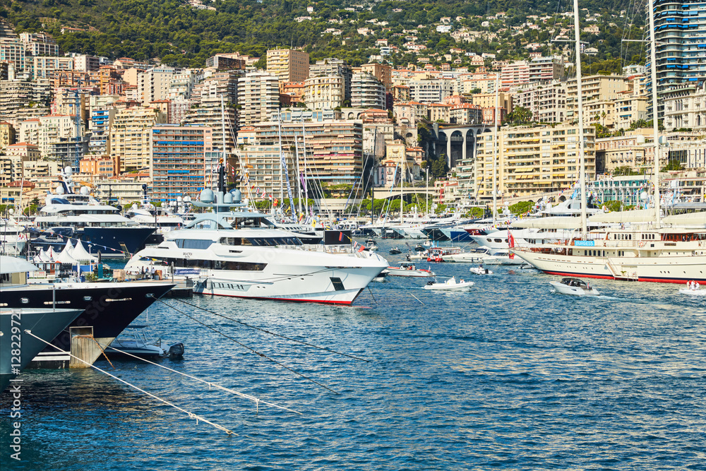 Monaco, Monte-Carlo, 29 September 2016: World Fair MYS Monaco Yacht Show, Port Hercules, luxury megayachts, many shuttles, taxi boat, presentations, Journalists, boat traffic, Azur water