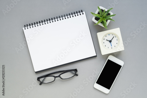 Desk above office desk with notebook stationery