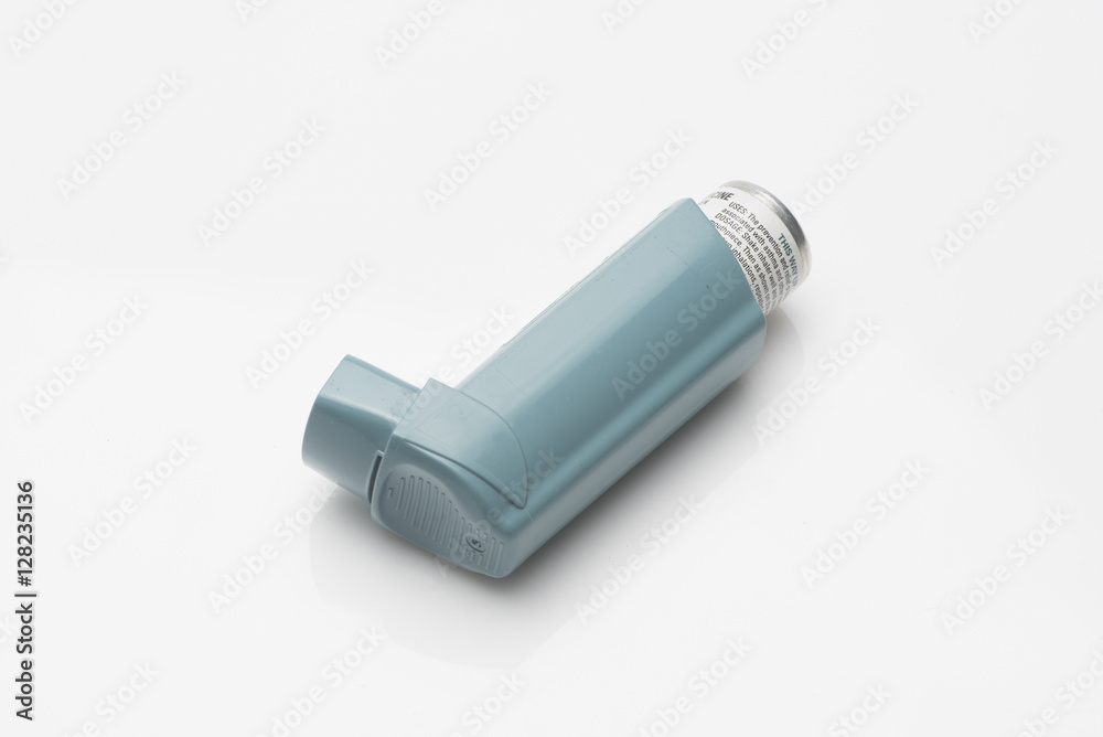 Asthma inhaler with spacer on white background Stock Photo | Adobe Stock