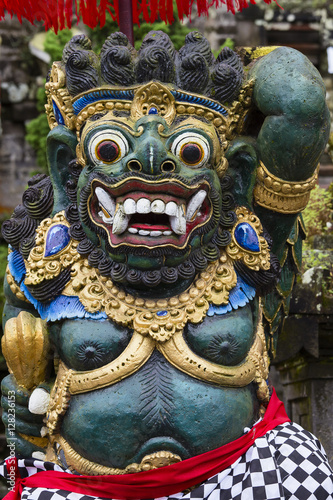 Traditional Balinese God statue in Central Bali temple. Indonesia