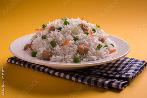 Billede på lærred Yummy soya pulao or pilav or pulav or rice or soyabean chunk fried rice with pea