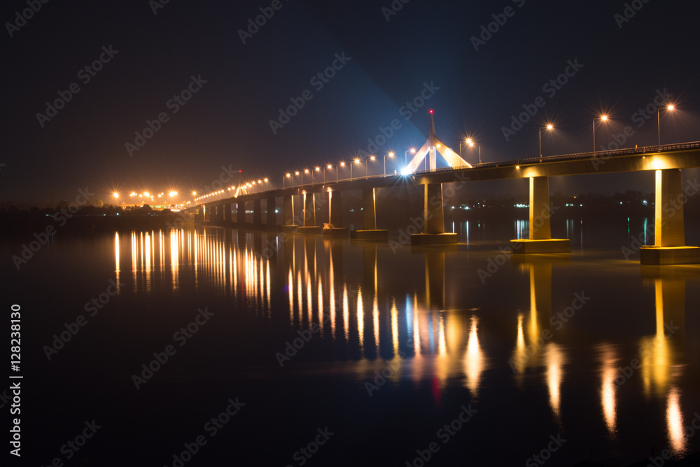 .Bridge vast pillar of fire and light electric lights lined the