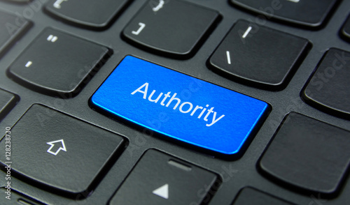 Принти на полотні Business Concept: Close-up the Authority button on the keyboard and have Azure,
