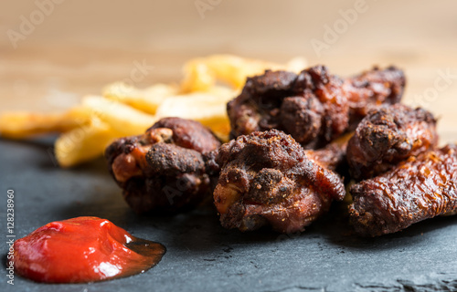 Wallpaper Mural Chicken wings with sauce and golden French fries potatoes Torontodigital.ca