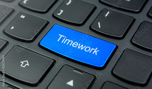Business Concept: Close-up the Timework button on the keyboard and have Azure, Cyan, Blue, Sky color button isolate black keyboard