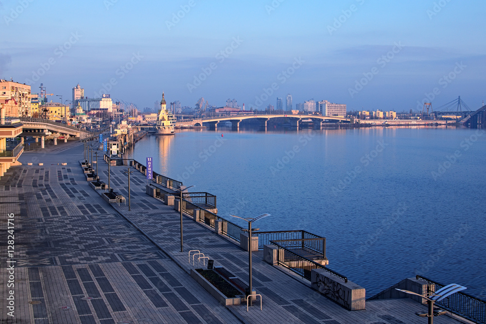 KYIV, UKRAINE – 16 November 2016: Morning view to the embankment near the river port. City landscape