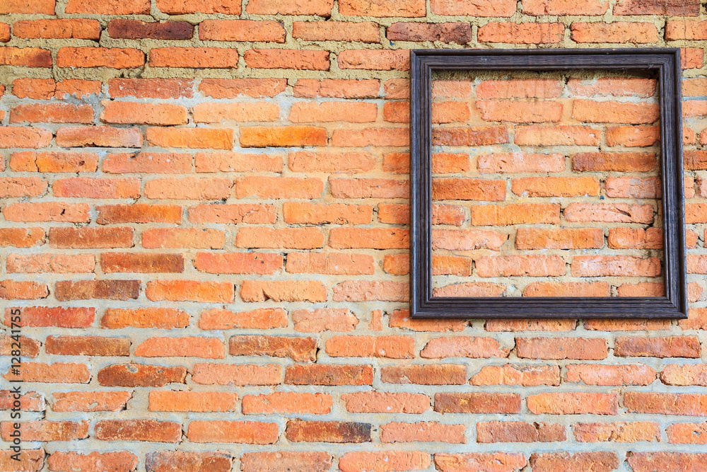 picture frame on brick wall. StockFoto Adobe Stock