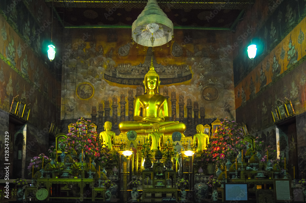 Statue of seated Buddha in ancient temple