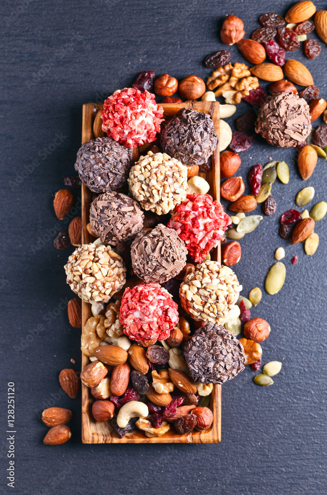 Homemade candy with chocolate , nuts and dried strawberry Homemade candy with chocolate , nuts and dried strawberry