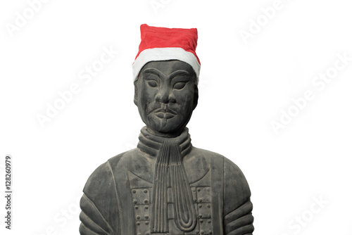 Chinese terracotta warrior statue with santa hat isolated on white background