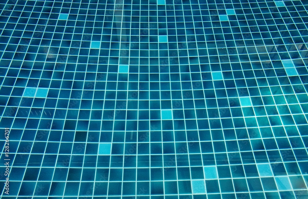 Surface of bright aqua blue mosaic glazed tile swimming pool background Surface of bright aqua blue mosaic glazed tile swimming pool background