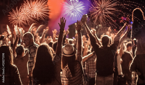 crowd watching fireworks at New Year